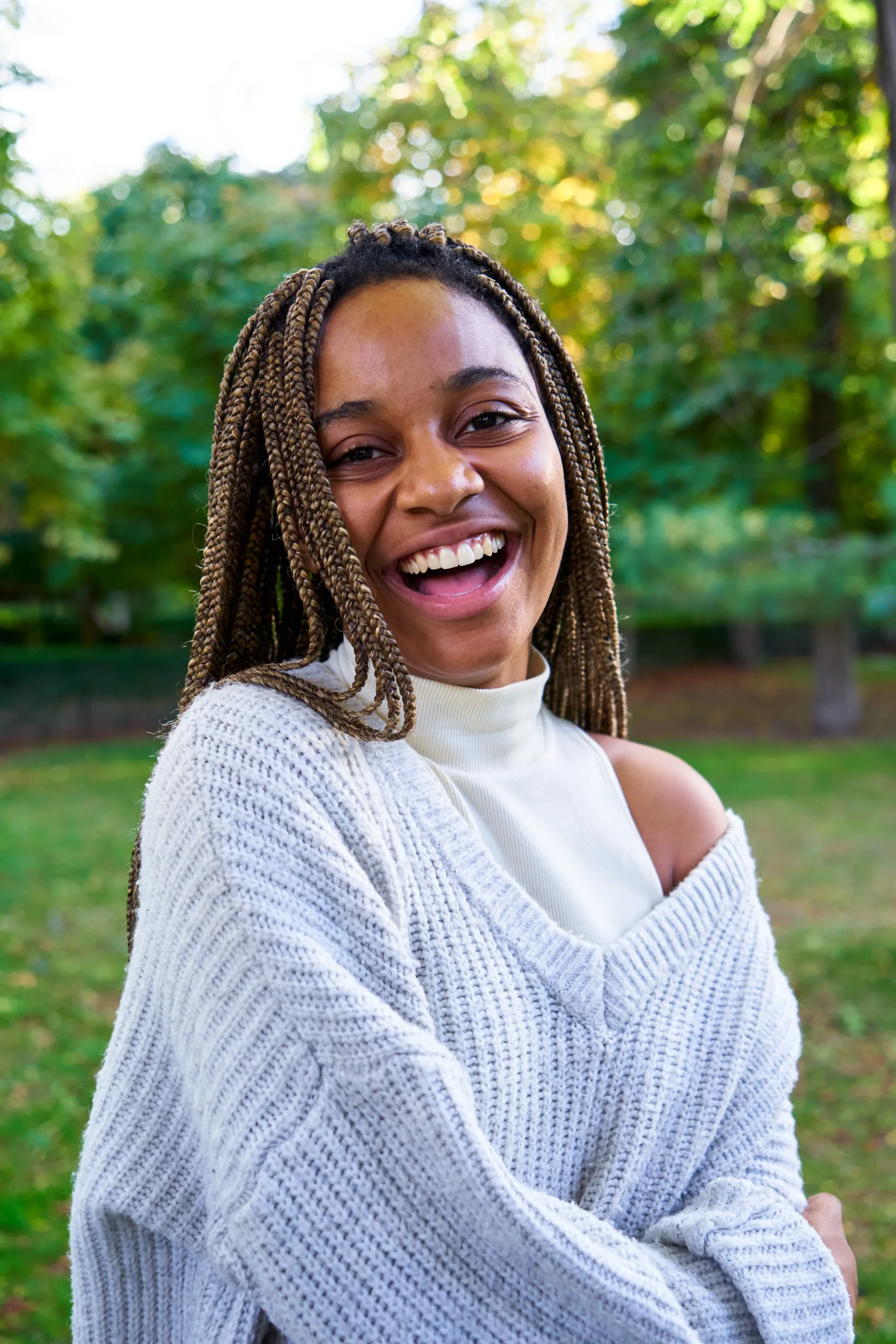 Vertical,Portrait,Of,A,Cheerful,Young,African,American,Woman,Looking